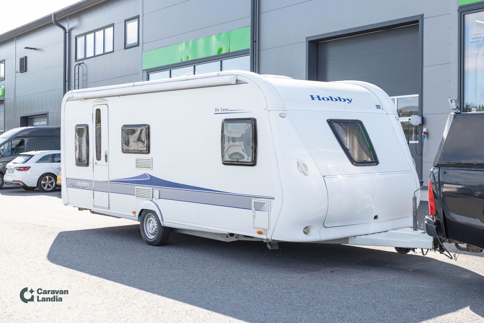 Hobby 560 KMFe Deluxe ** TRUMA, PITKITTÄINEN-PARIVUODE, KERROSSÄNKY, PYÖRÄTELINE **, kuva 1