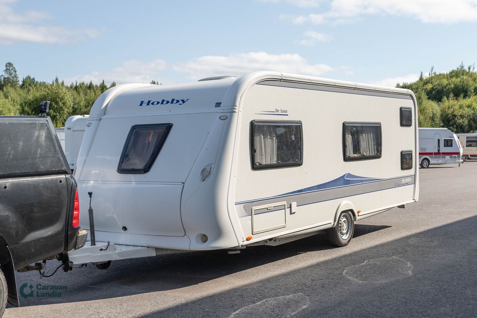 Hobby 560 KMFe Deluxe ** TRUMA, PITKITTÄINEN-PARIVUODE, KERROSSÄNKY, PYÖRÄTELINE **, kuva 5