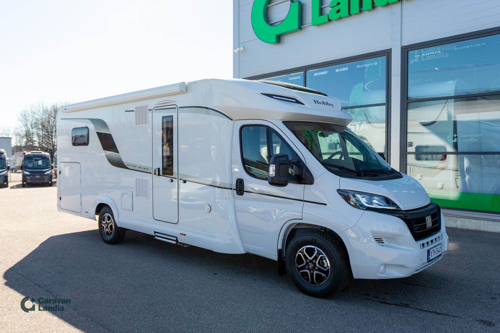 Hobby Optima De Luxe T70 GE 140hv **AJAMATON, ERILLISVUOTEET, LATTIALÄMMITYS, UUNI, P.KAMERA, MARKIISI**, kuva 1